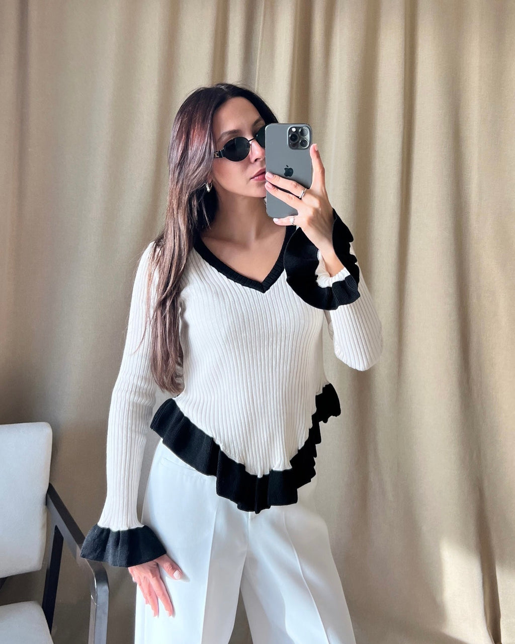 V-neck black ruffle detail ecru sweater