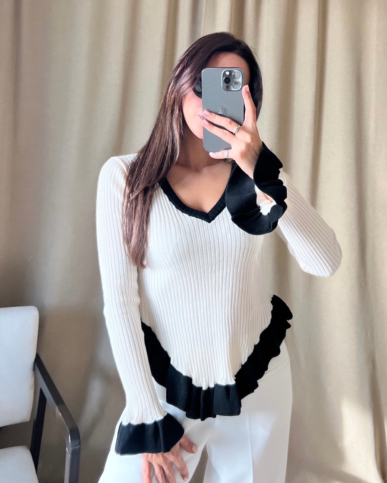 V-neck black ruffle detail ecru sweater