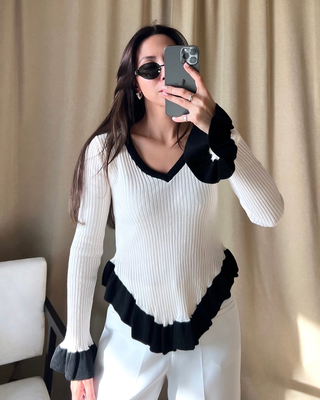 V-neck black ruffle detail ecru sweater